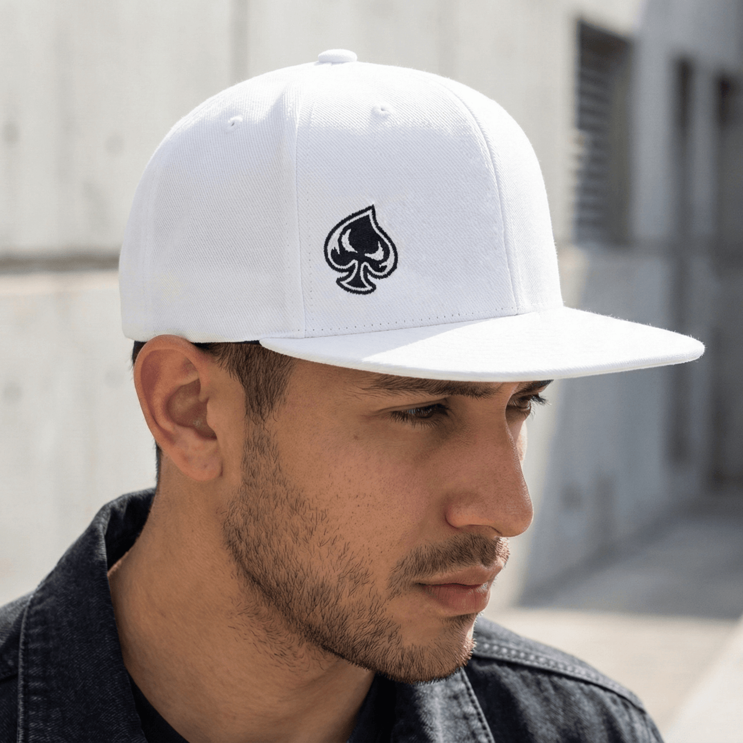 Ai generated picture of a man wearing a white hat with a spade logo