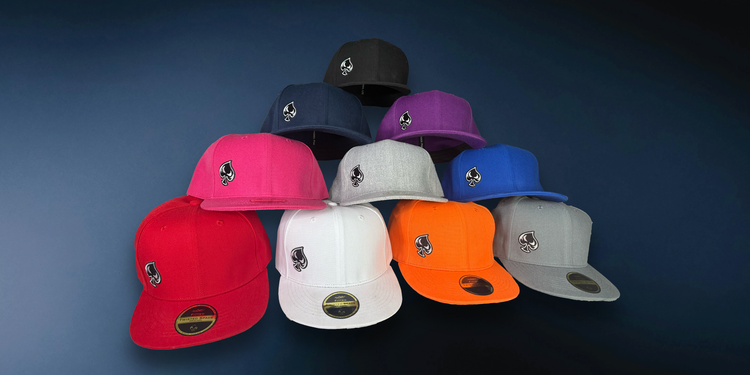 A stack of different colored hats